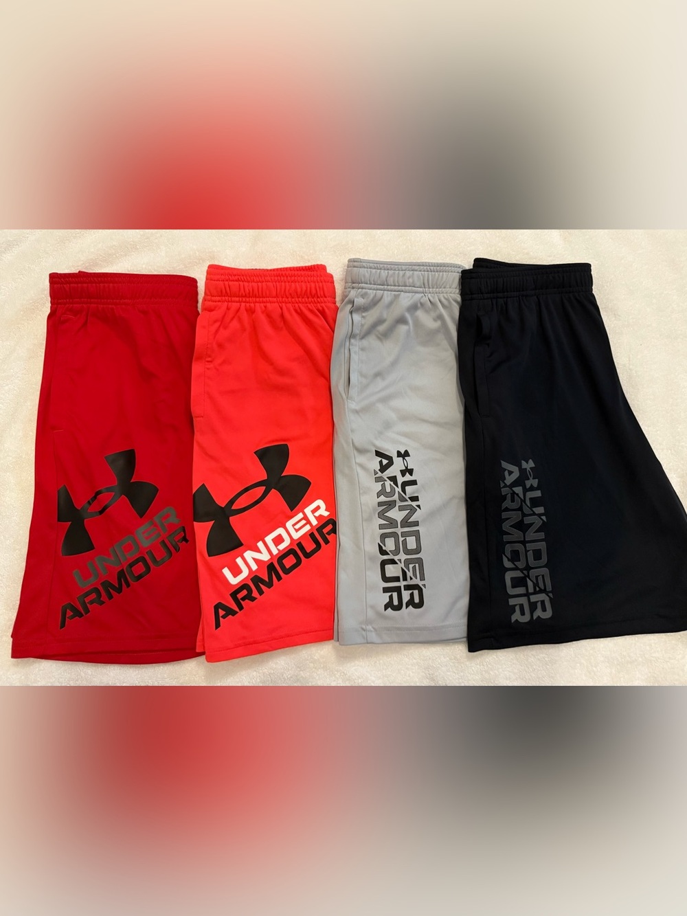 Under Armour Kids' Athletic Shorts in Red, Coral, Gray, and Black- Size L
